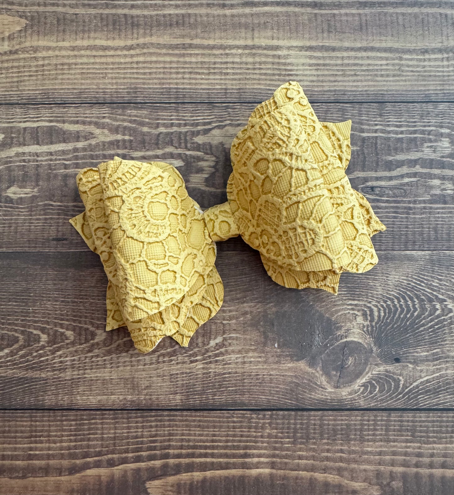 Embossed 4" Leather Bow