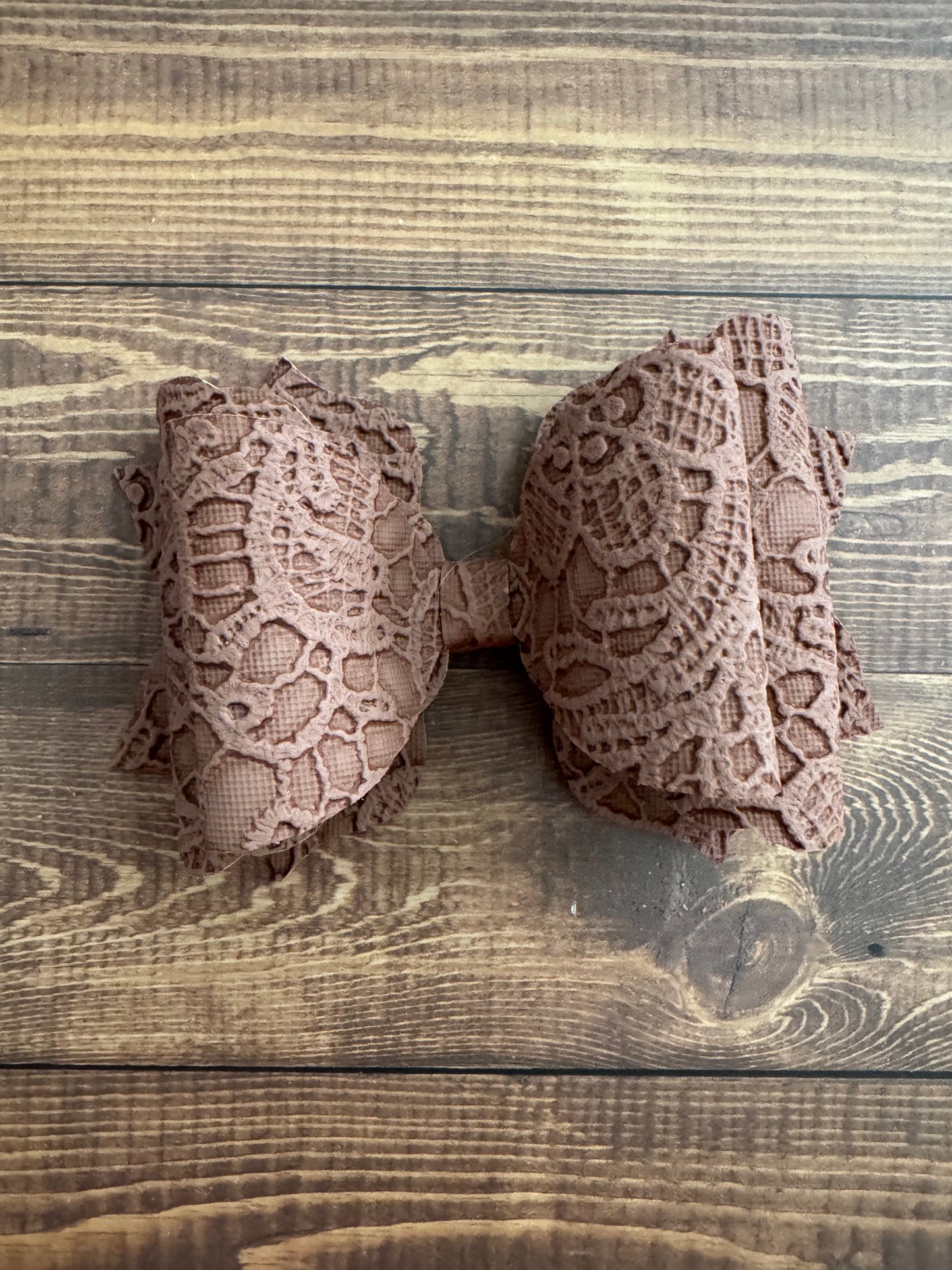Embossed 4" Leather Bow
